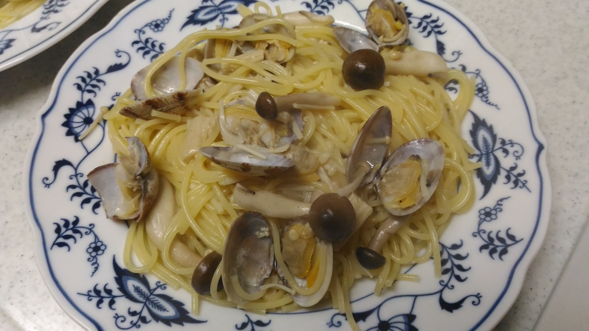 キノコとあさりのパスタの写真