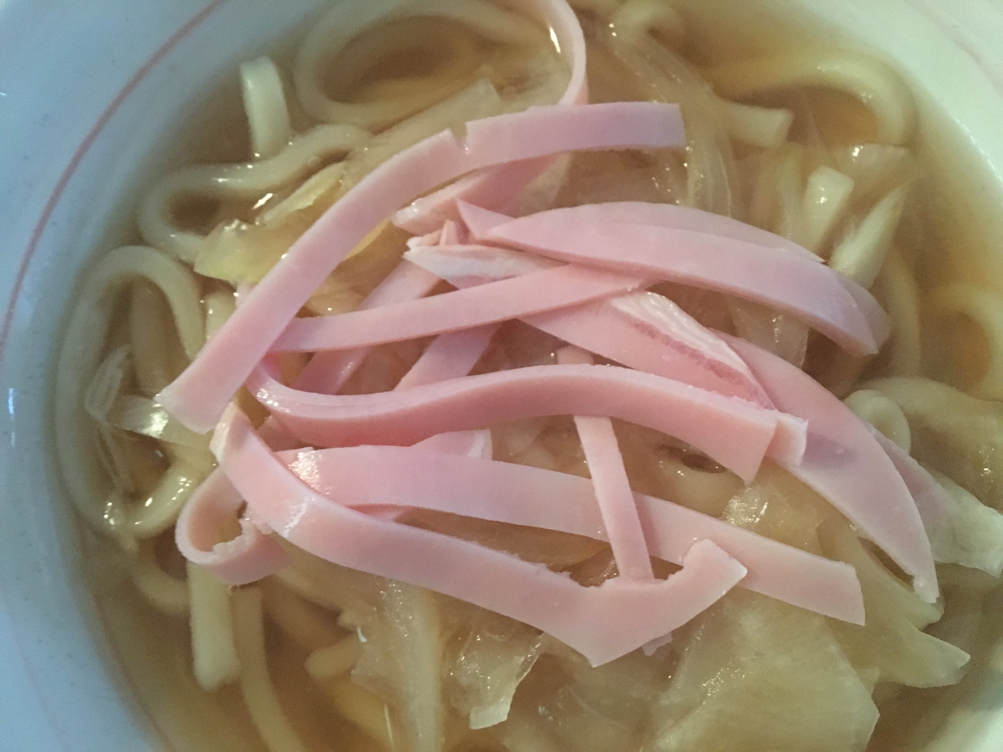 生姜と大根と玉ねぎとエノキのハムうどんの写真