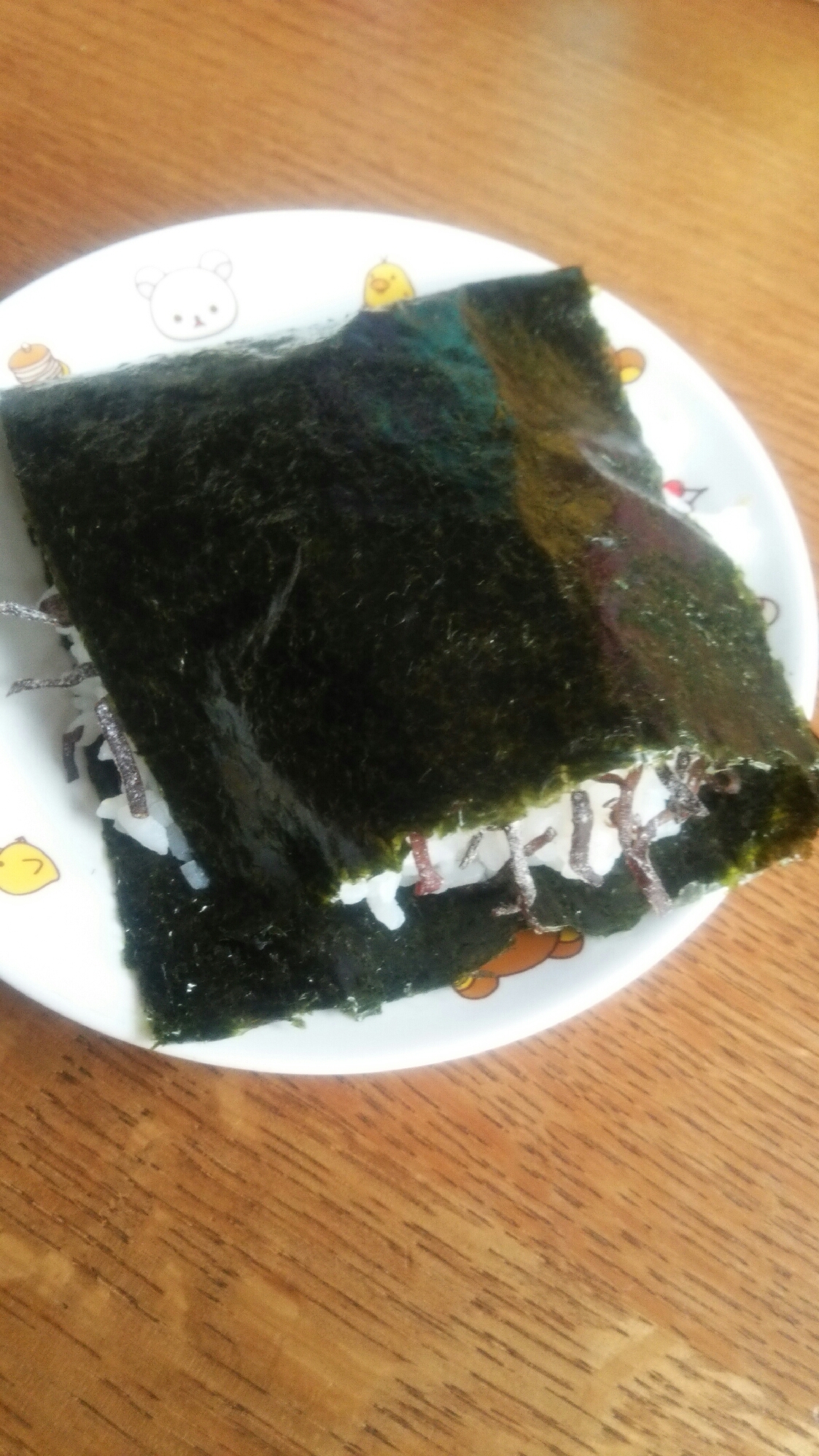 さつまいもと塩昆布の海苔巻きおにぎりの写真
